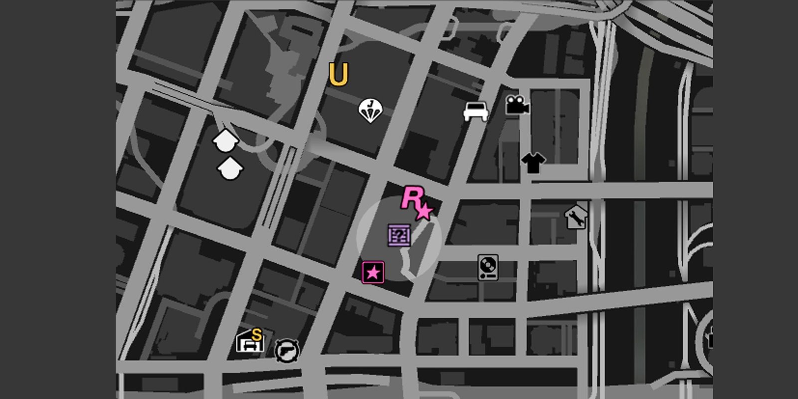 Image depicts Legion Square on the GTA Online map, indicated with a grey circle and the purple G's Cache crate icon.