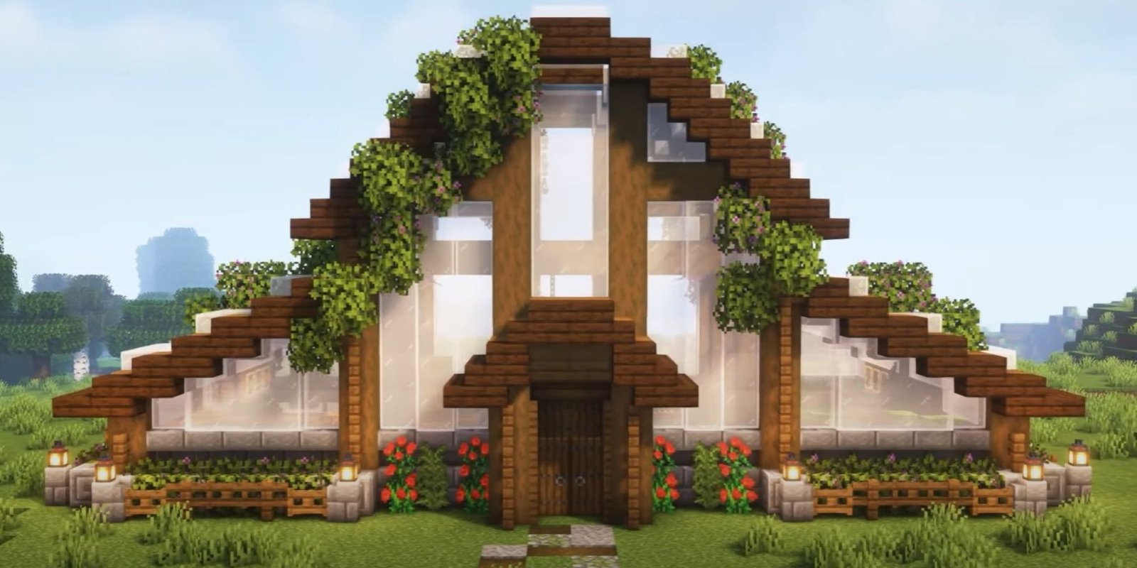 An image from Minecraft of a Cottage Core Greenhouse, which has clear white windows and houses plants safely from monsters.
