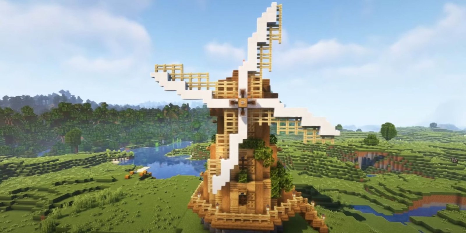 An image from Minecraft of a large windmill, which contains villagers that will constantly farm and replenish your crops without you having to work at all.