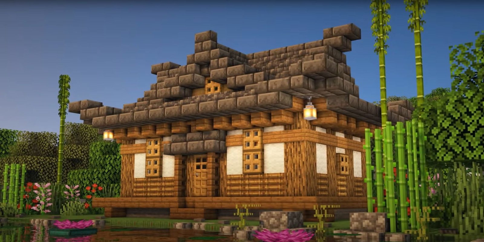 An image from Minecraft of a Japanese Survival House, which uses deep slate to make a peaked roof. 