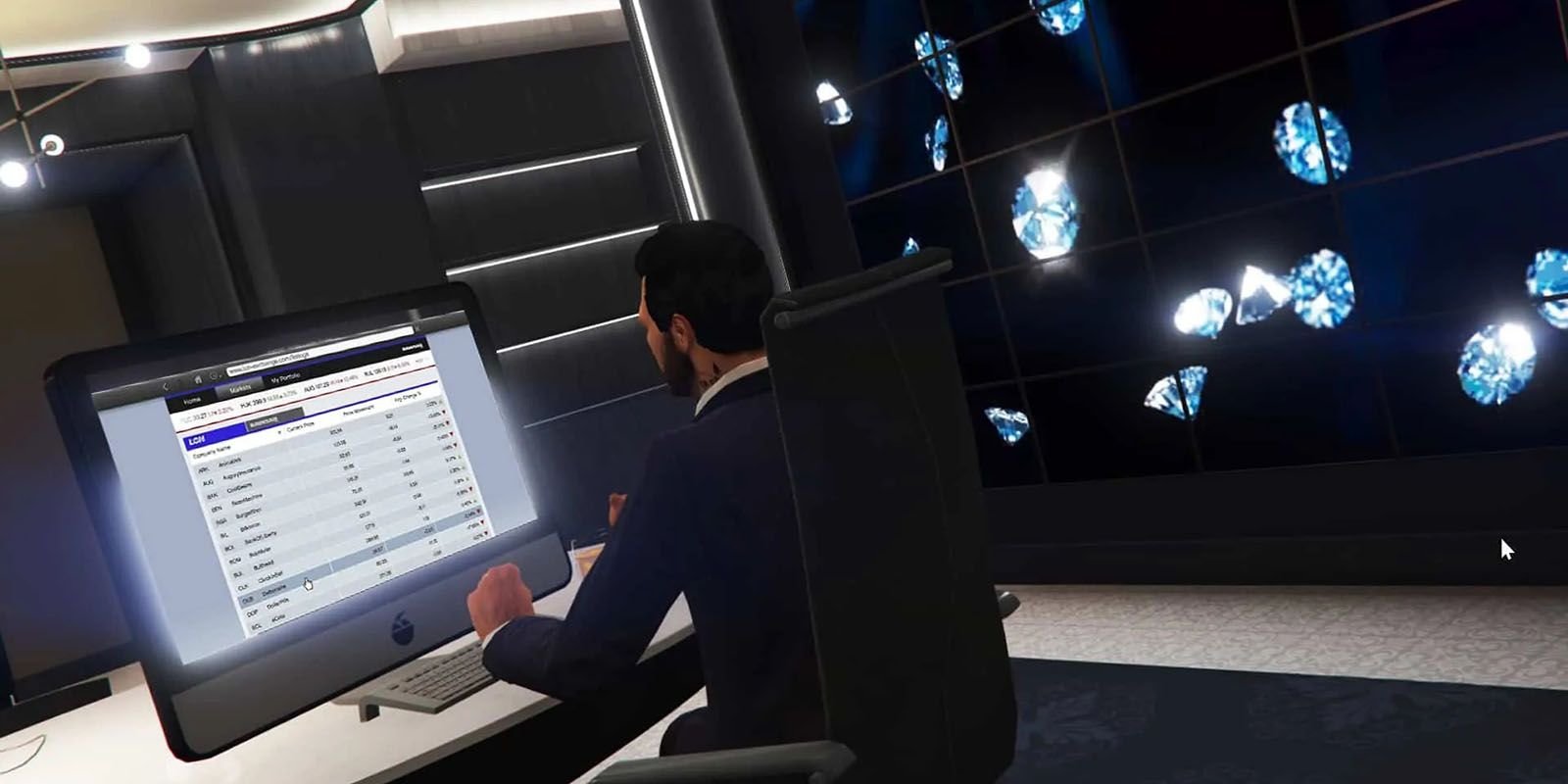 A man at his computer in Grand Theft Auto 5