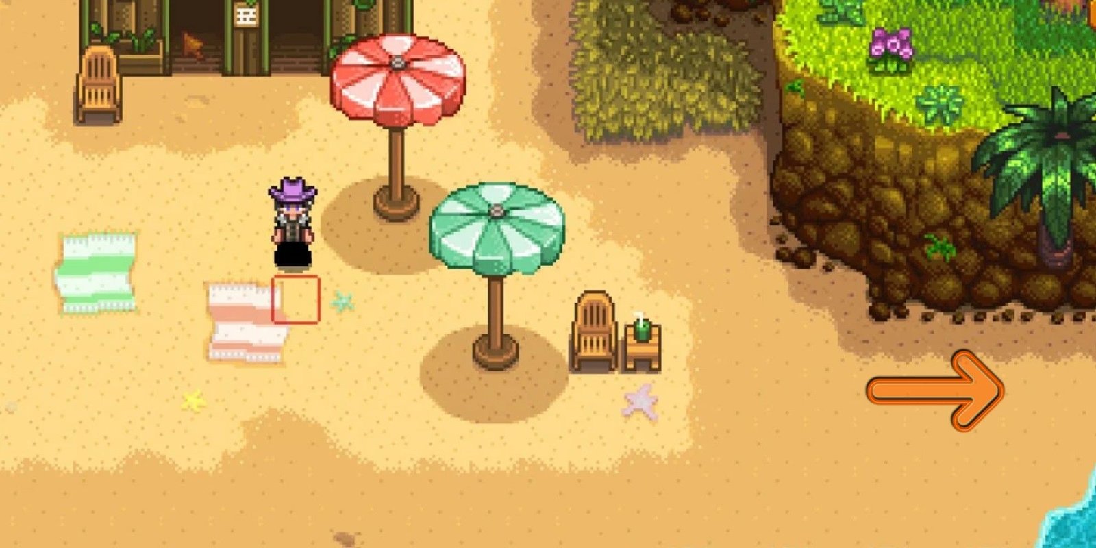 arrow pointing to entrance of pirate cove area near beach chair and umbrellas in Stardew Valley