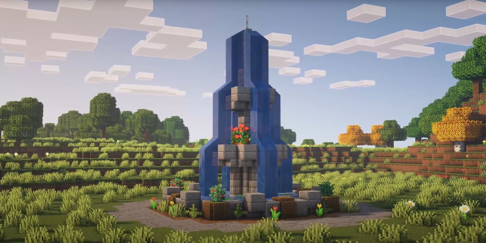 An image from Minecraft of a large fountian that can be placed at the center of a village to mark a gathering spot.
