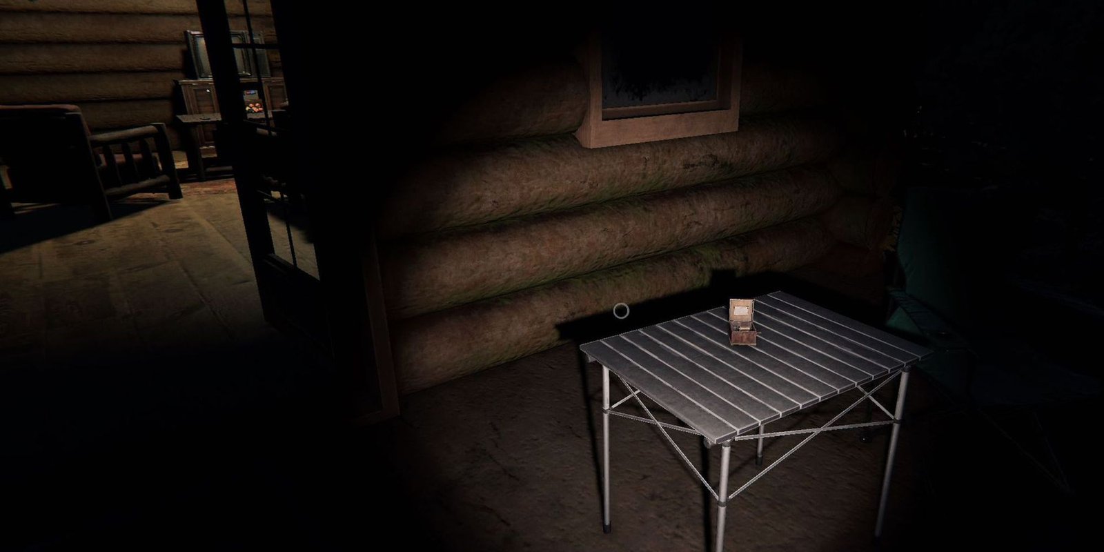 Image depicts a small metal camping table outside of a log cabin with a music box inside in Maple Lodge Campsite in Phasmophobia.