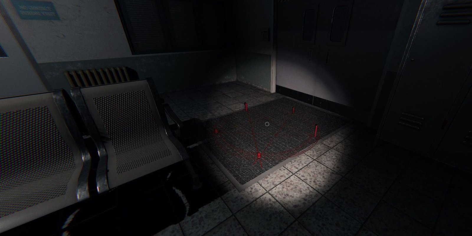 Image depicts a red summoning circle on the ground in the Prison in Phasmophobia.