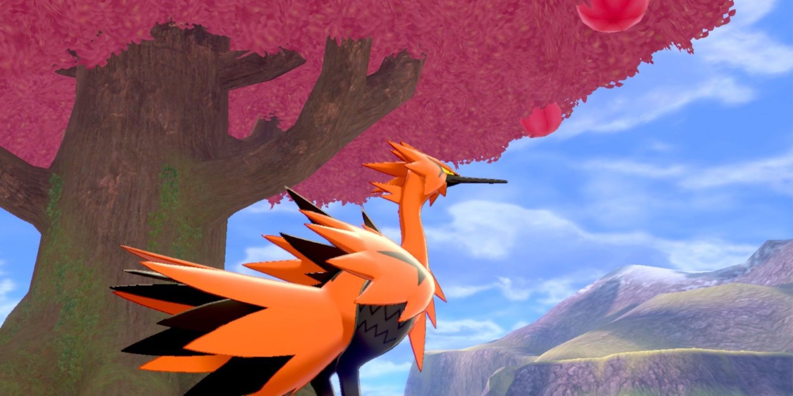 Galarian Zapdos in front of a tree