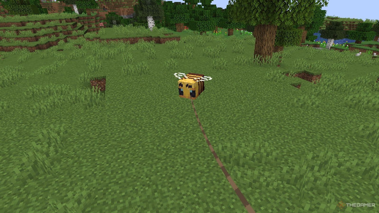 A Minecraft bee on a lead.
