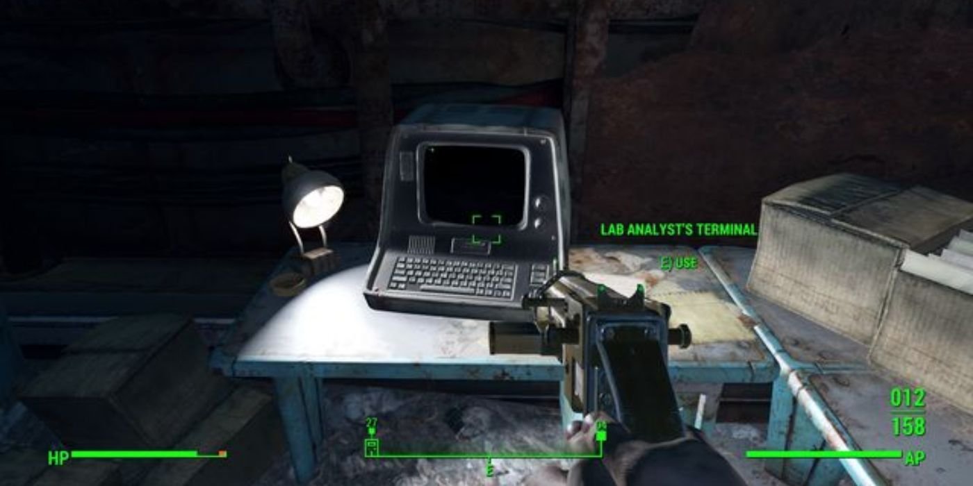 Screenshot of the player approaching a Terminal with a pistol out in Fallout 4