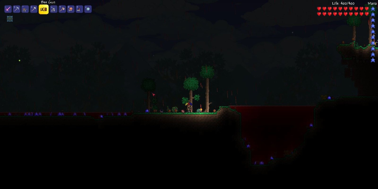 player standing during the night surrounded by mana stars