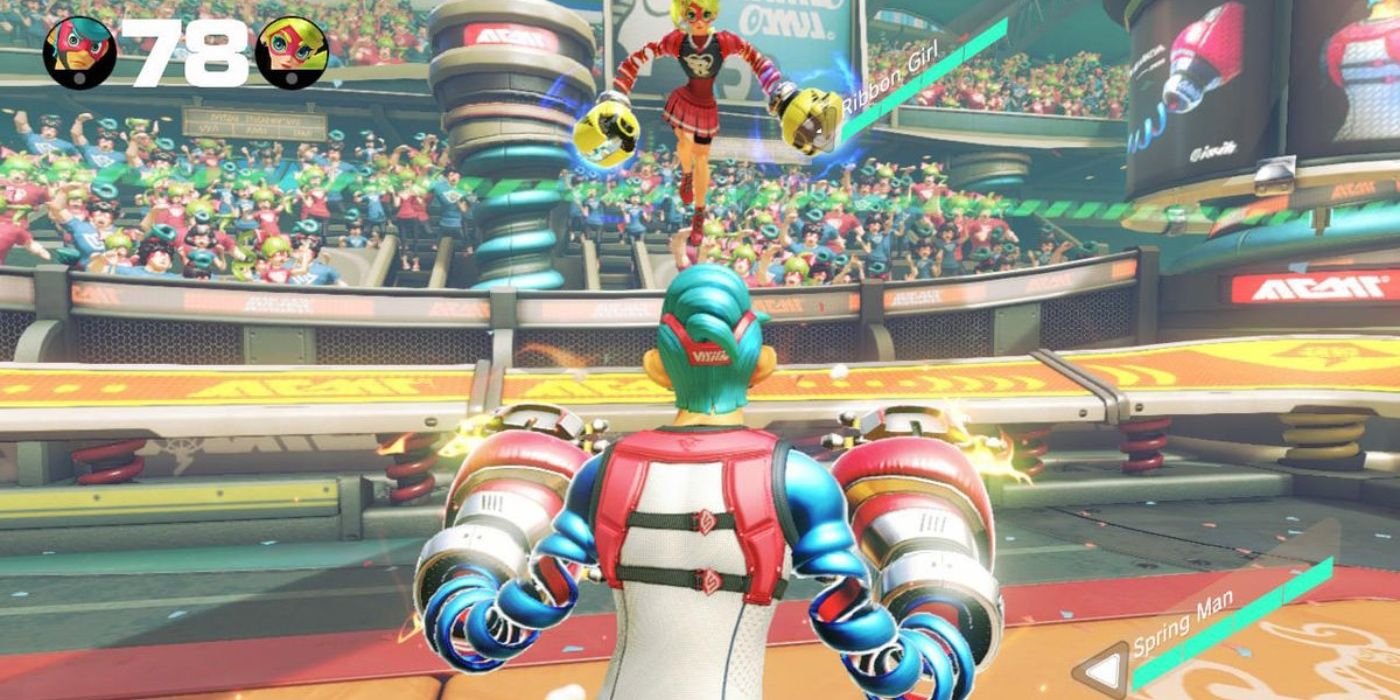A battle taking place between Spring Man and Ribbon Girl in ARMS.