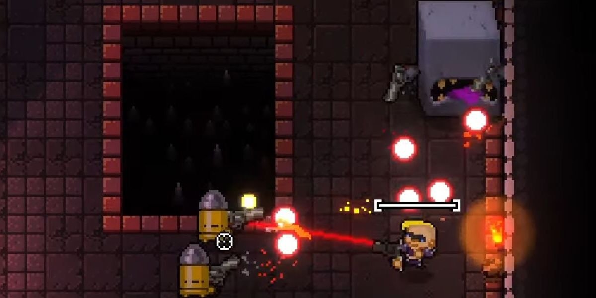 A Wall Mimic attacks the Convict in Enter the Gungeon.