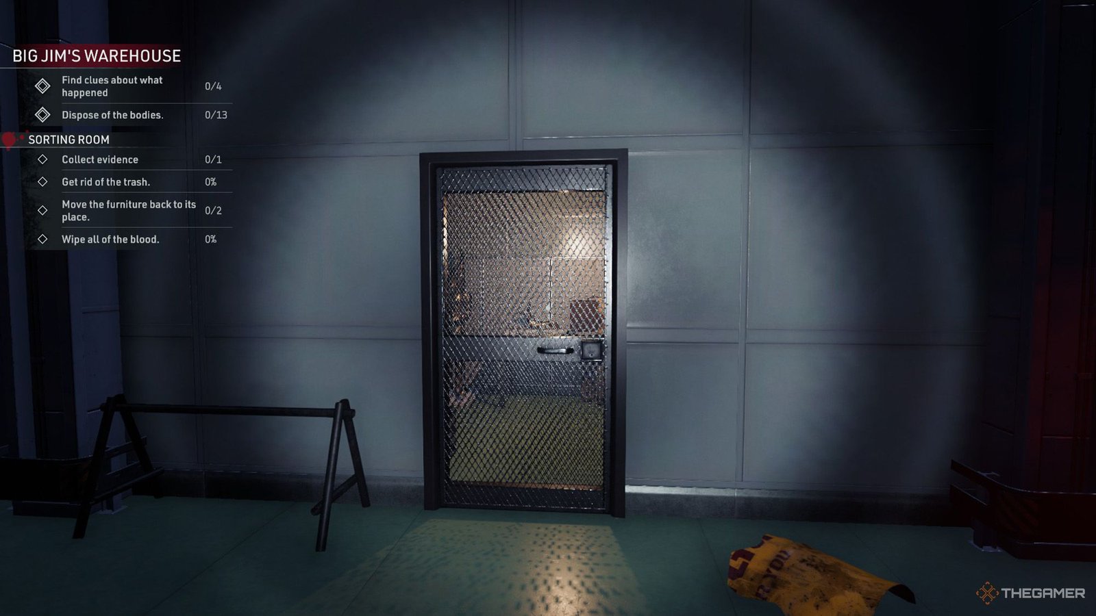 Kovalsky is in front of a wired door inside the sorting room in Crime Scene Cleaner.