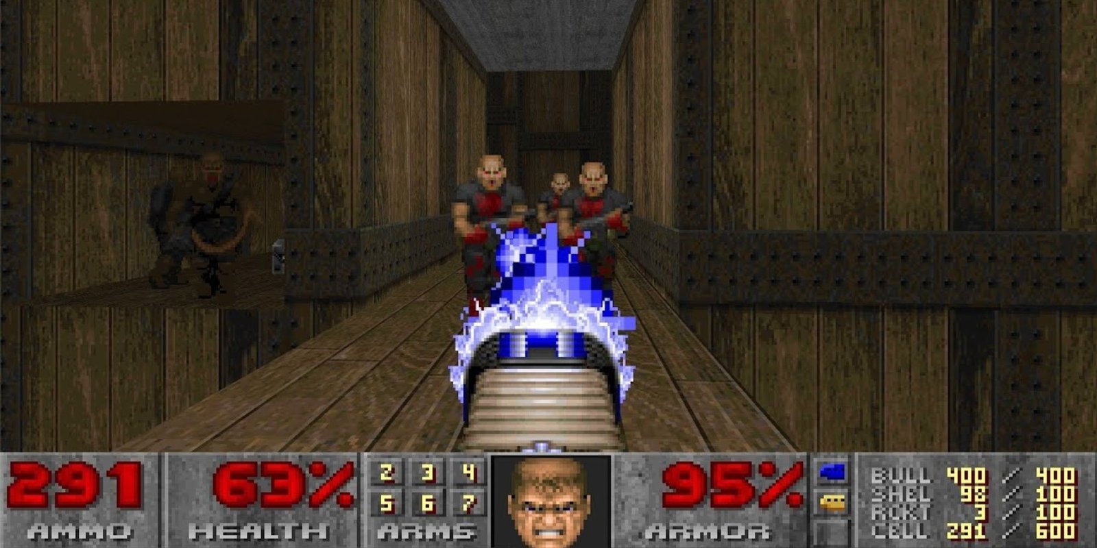 Doom 2 Hell on Earth first person view of soldiers being shot by a blue bolt gun.