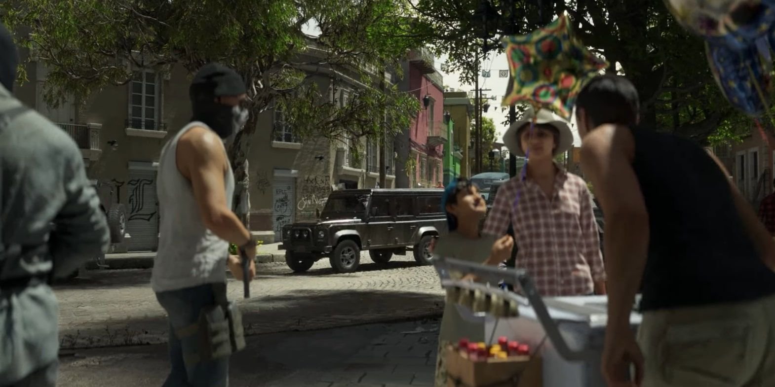 Screenshot of a boy receiving a balloon from Las Almas cartel members in COD Modern Warfare 2.