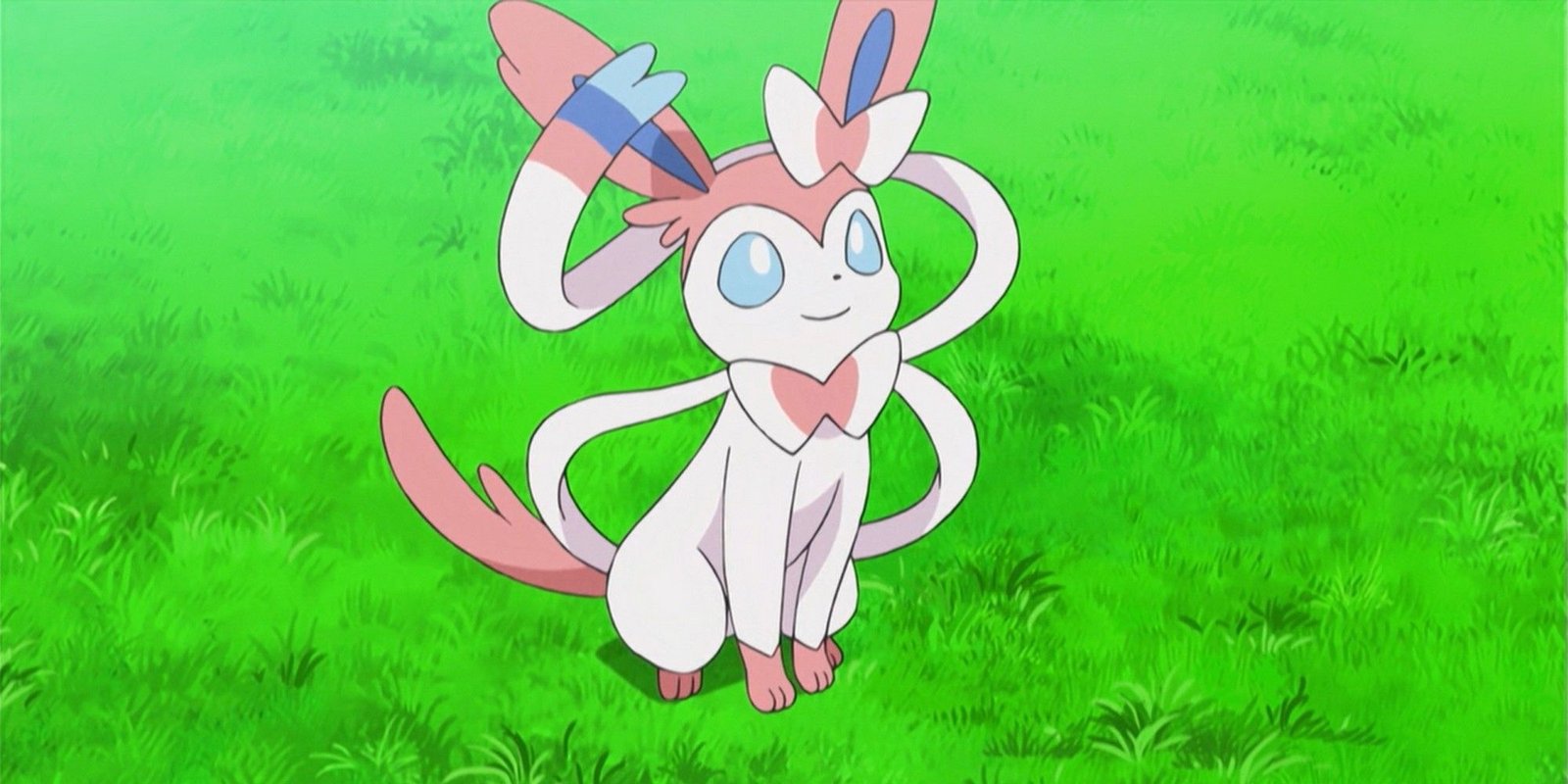 Sylveon is sitting in the grass in Pokemon.