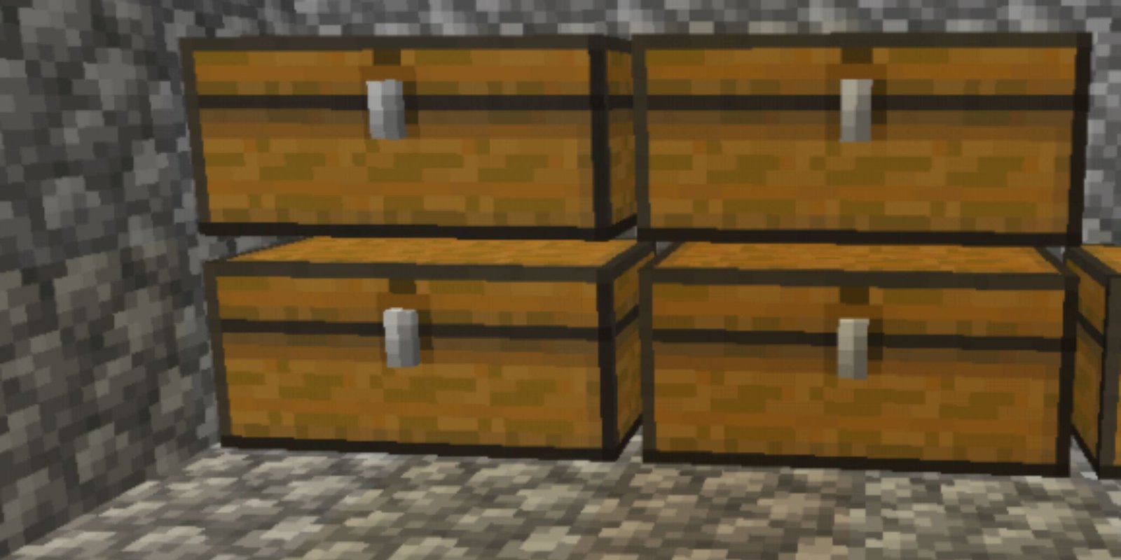 Four chests stacked in a building in a 2x2 arrangement. 