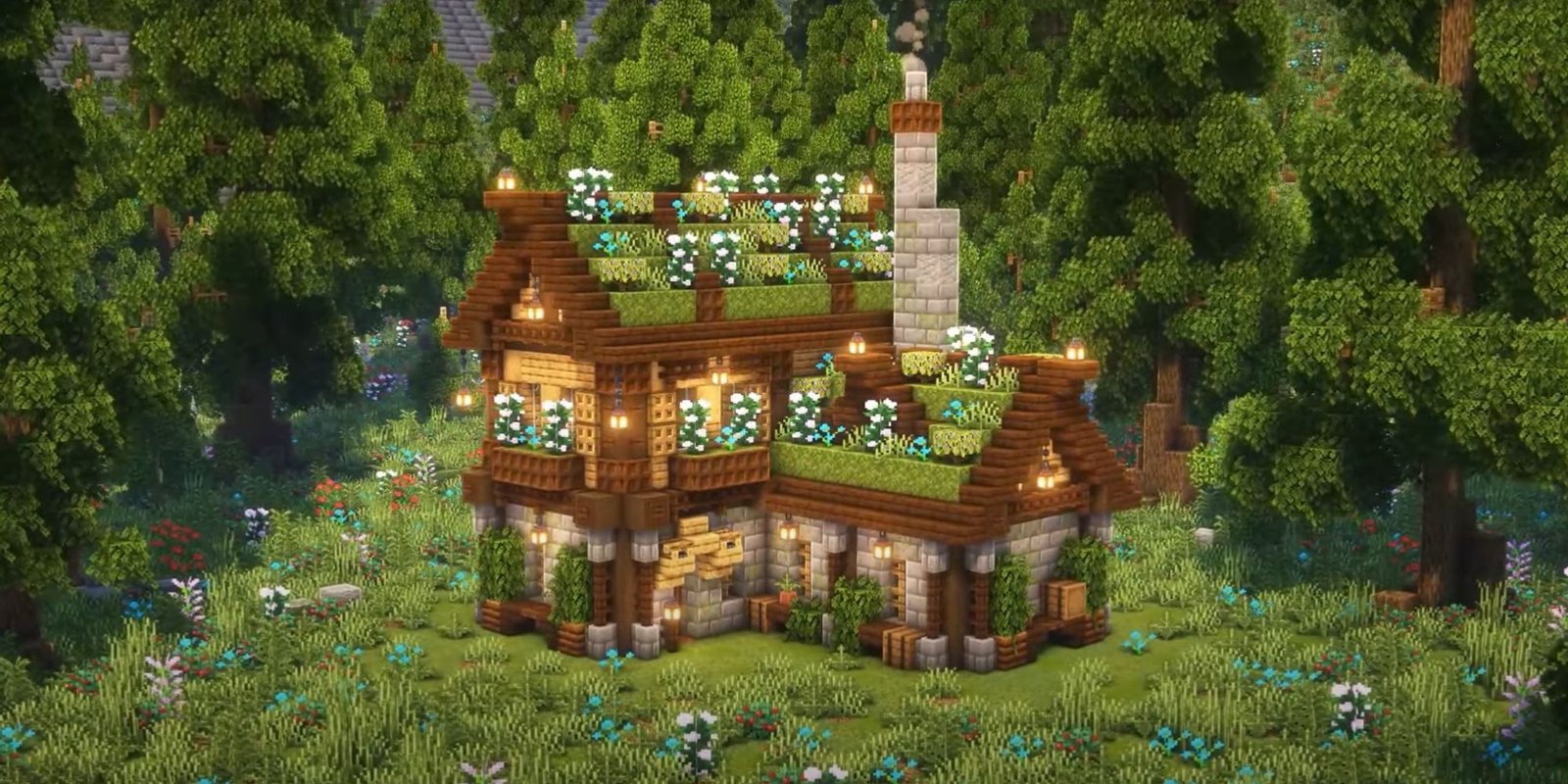 An image from Minecraft of a smaller Dark Oak House, with grass on ther roof to create an earthen aesthetic. 