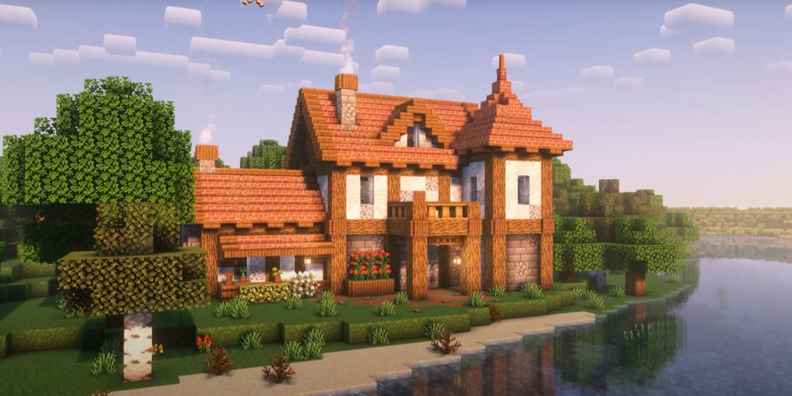 An image from Minecraft of a classice house with a brick roof. This house is made out of logs and diorite.