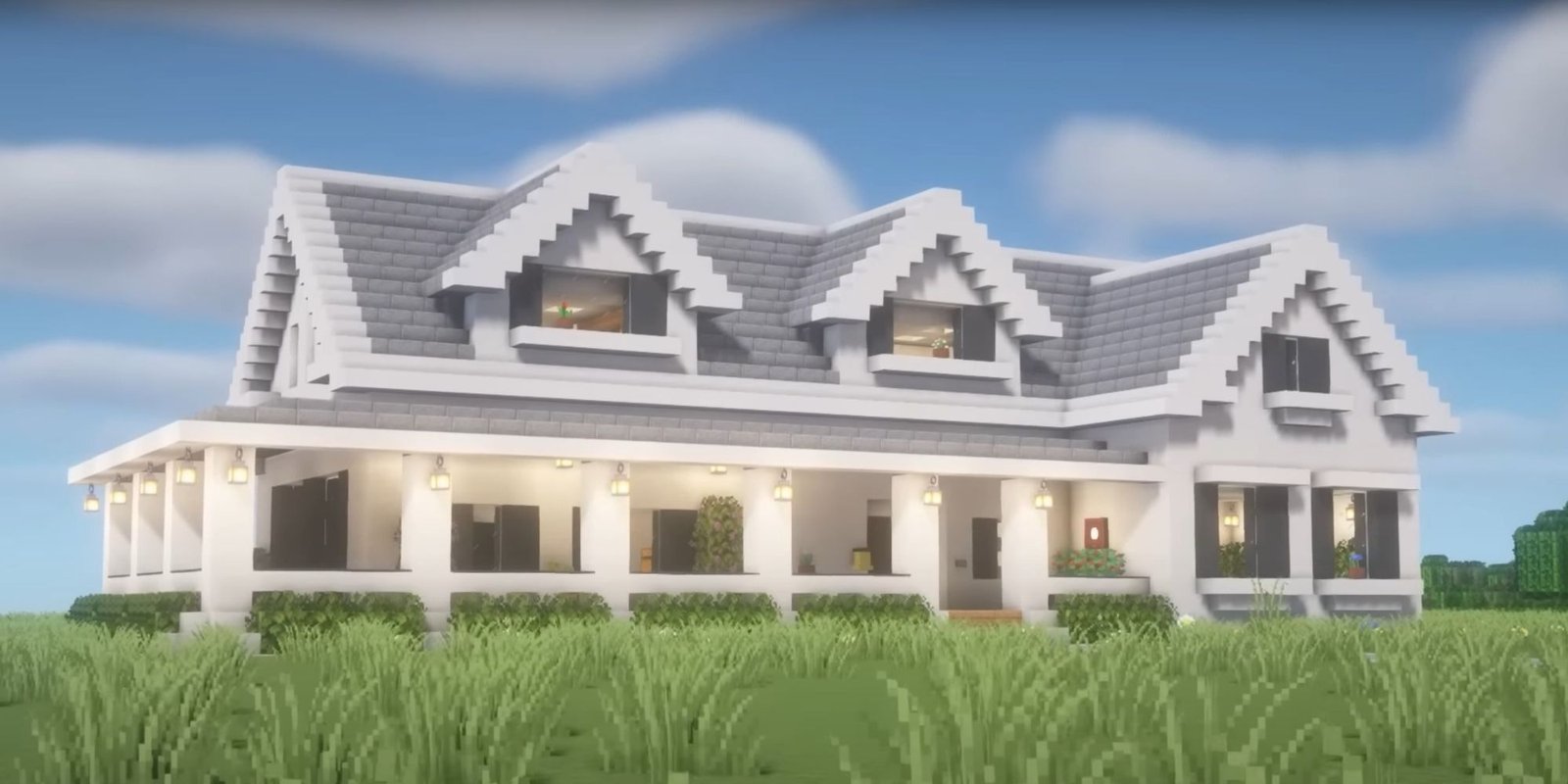 An image from Minecraft of a Suburban House made out of white quartz and stone bricks. This house resembles modern family homes from American suburbs.