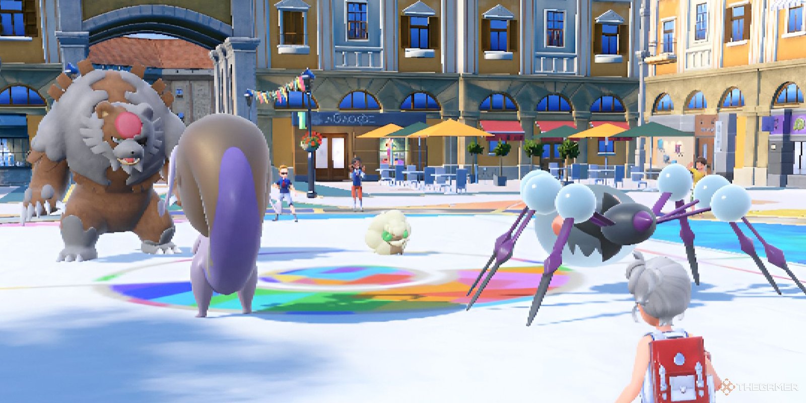 Two trainers engage in a double battle. in Pokemon Scarlet & Violet.
