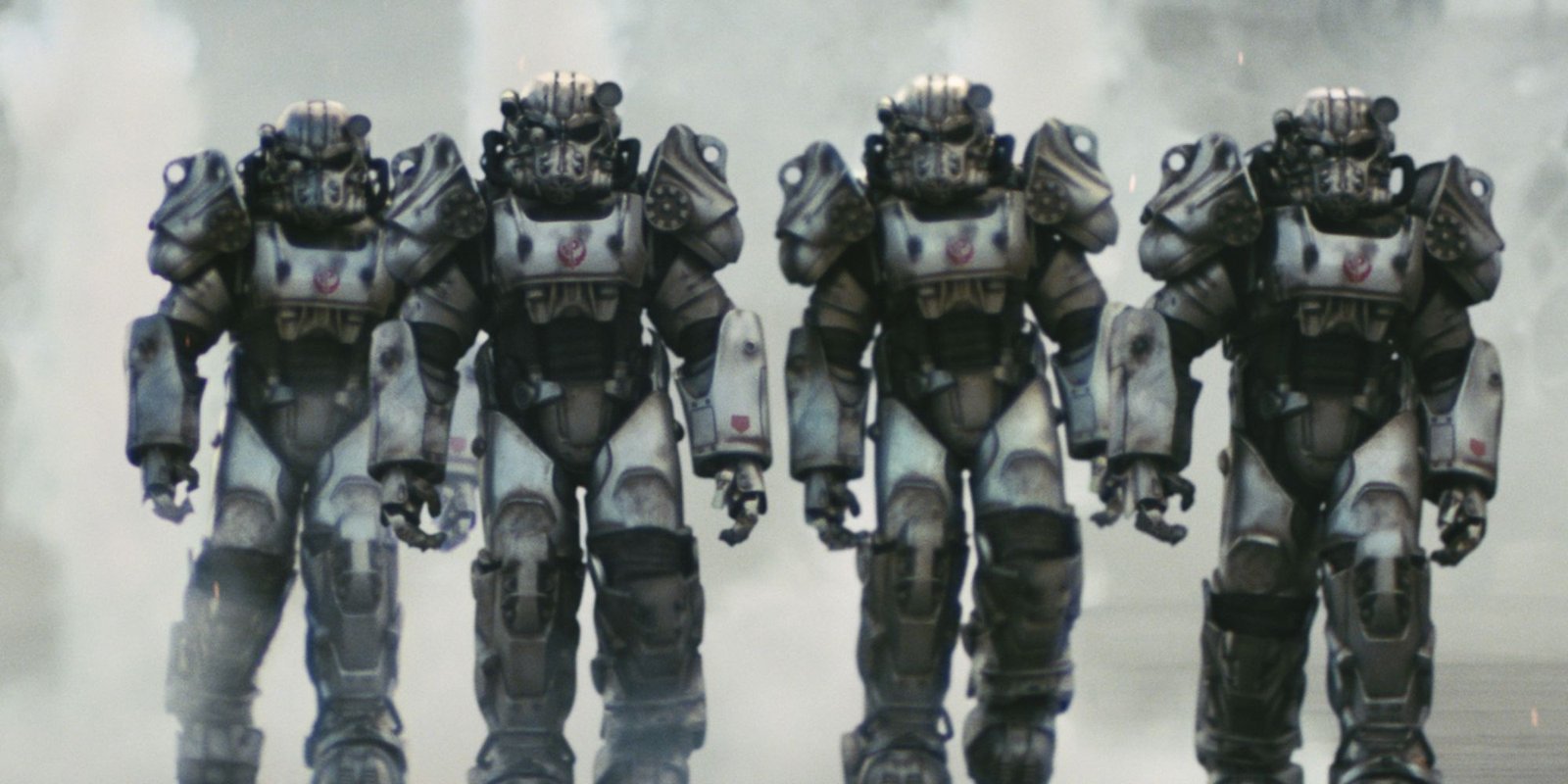 Four Brotherhood of Steel Knights in the Fallout show, all wearing huge power armor